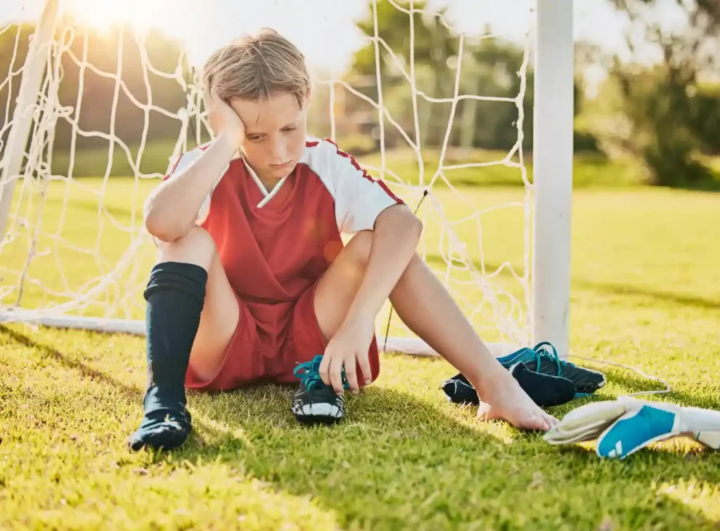 Young boy injured playing football