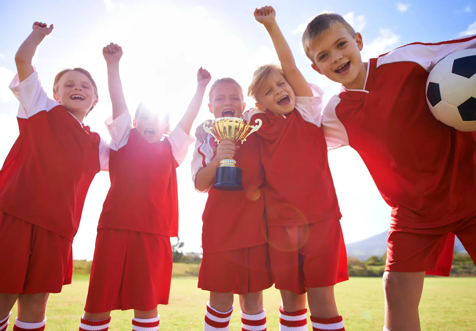 Youth Football Team Celebrating
